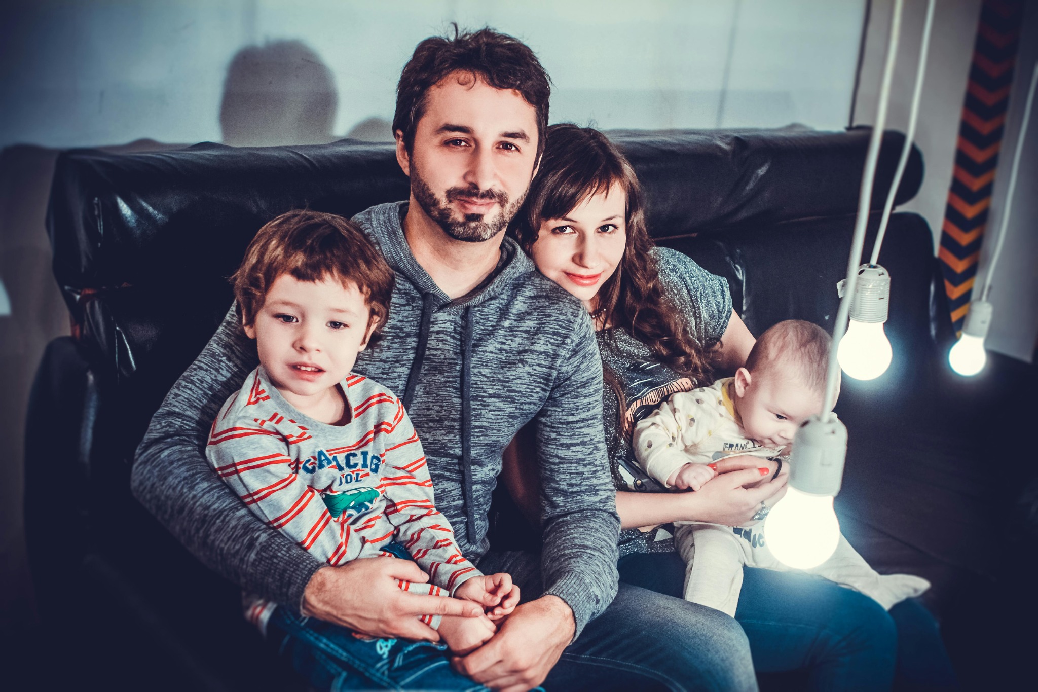 Family sitting together indoors